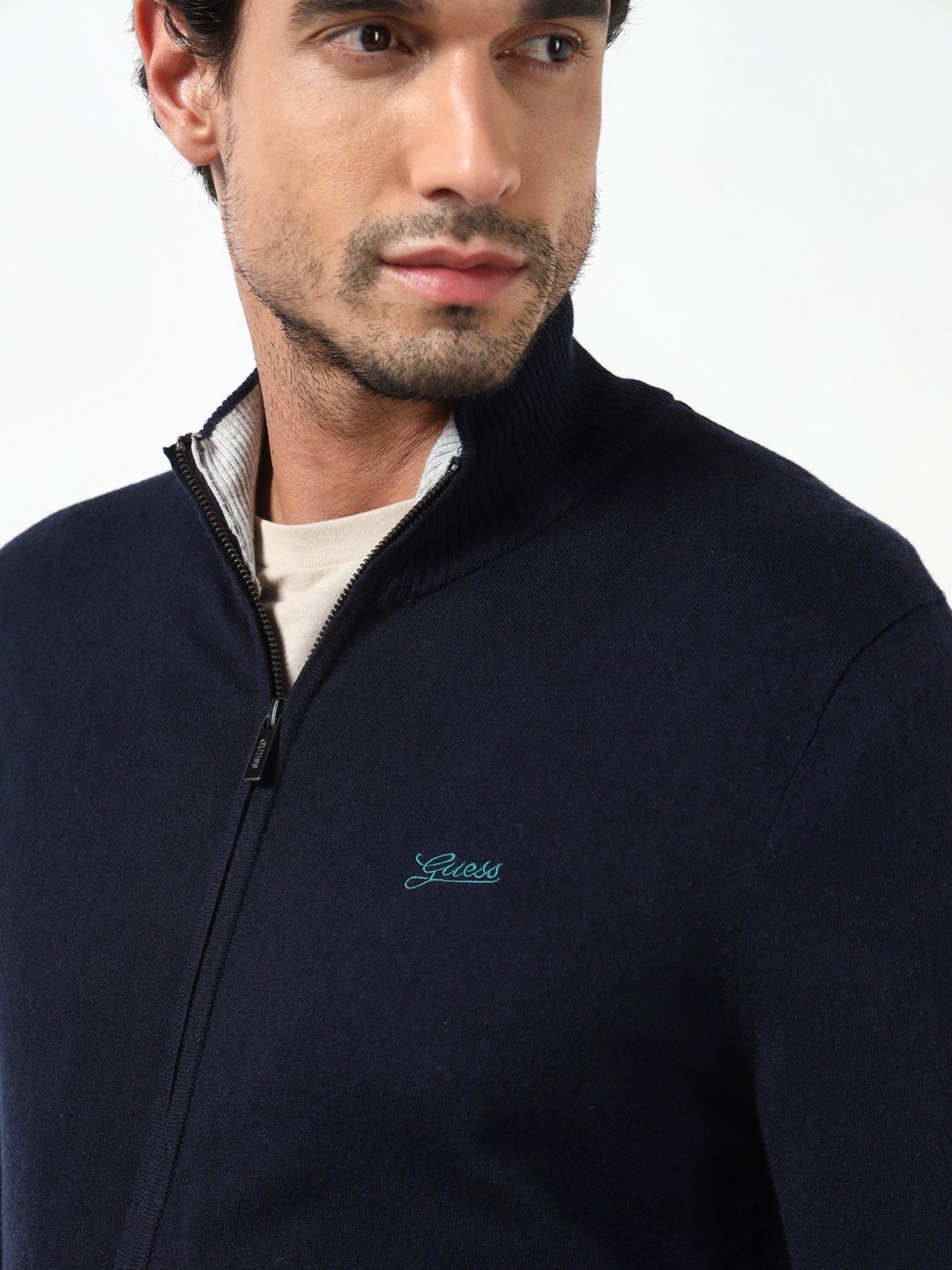 Brennan Smart Blue Solid High Neck Full Sleeves Knit Sweaters